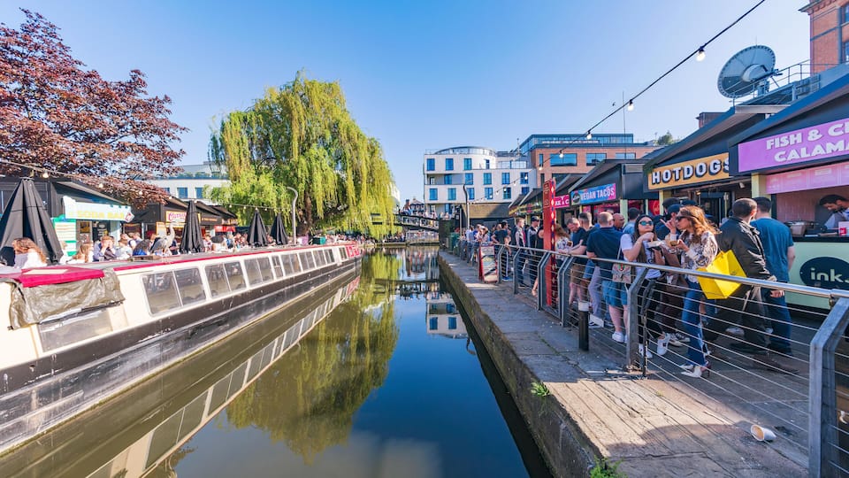 P3N8HK LONDON, UNITED KINGDOM - MAY 05: View of the Kerb food market and camden canal where people come to eat street food on May 05, 2018 in London