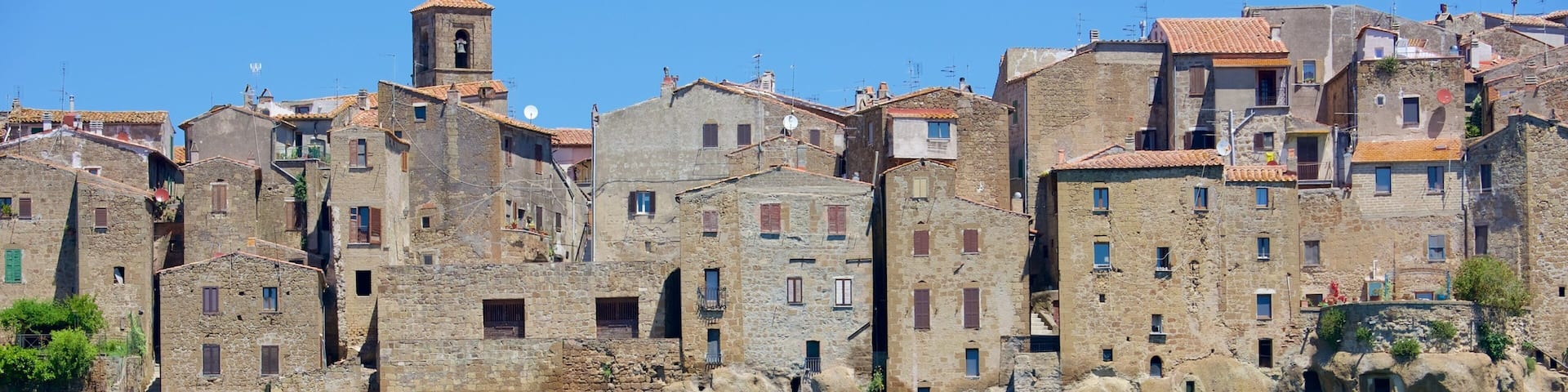 Pitigliano which includes a city and heritage elements
