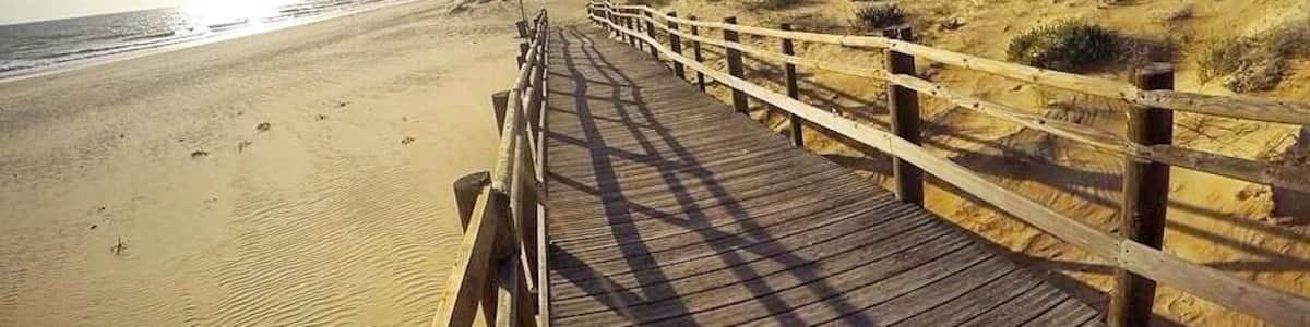 Monte Gordo. A very touristic but beautiful place located on the East side of The Algarve. We caught the train from Fuseta which was over an hour long and then annoyingly the #beach and main area was a 20 minute walk from the station in Monte Gordo. However it was the first beach we visited in The Algarve and it made it onto our '6 best beaches to visit in The Algarve' blog post which you can read here: http://www.britandtheblonde.com/discoveries/5-best-beaches-algarve-portugal/