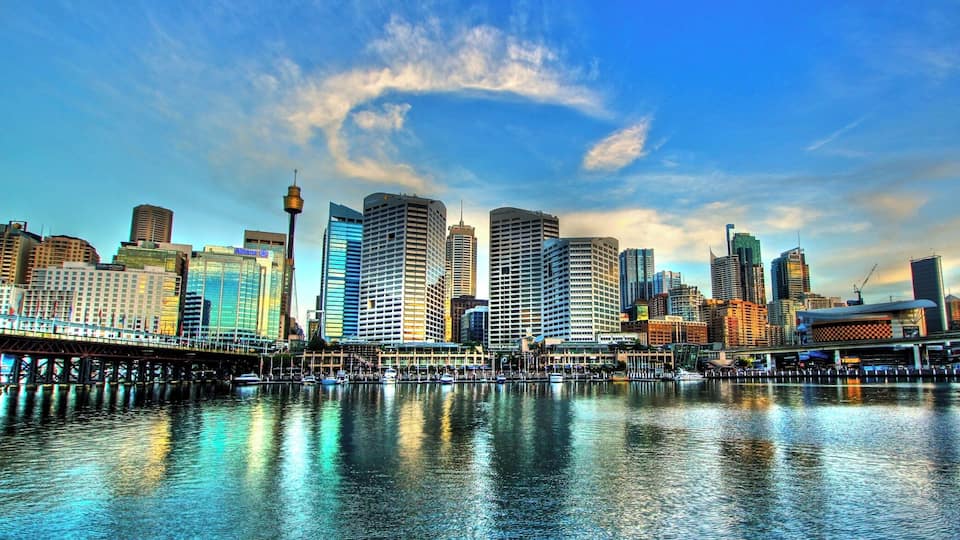 A city skyline with modern skyscrapers and a waterfront.