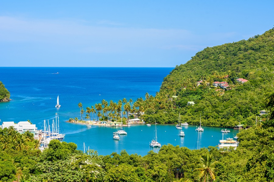 Marigot Bay, Saint Lucia, Caribbean. Tropical bay and beach in exotic and paradise landscape scenery. Marigot Bay is located on the west coast of the Caribbean island of St Lucia.; Shutterstock ID 725