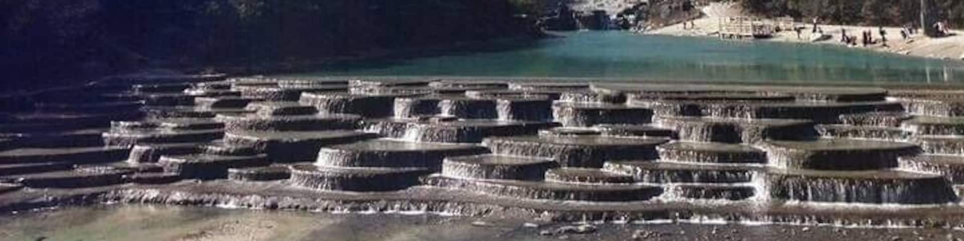 Blue Moon Valley actually is an extremely blue river meandering through a lush valley of Jade Dragon Snow Mountain. Seen from a distance, it resembles a blue crescent moon inlaid at the foot of the mountain. That's how the place got its beautiful name. Blue Moon Valley, Lijiang, China #Trovember #BlueMoonValley #Lijiang #China