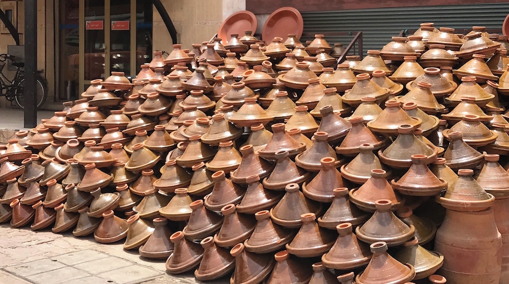 A pottery store displays tajines outside. One of many stores inside the Medina in the town of Tiznit Morocco. #tiznit #morocco #locallife #tajine #pottery #localpottery #moroccanpottery #cookware #flashpackingbarbie #stoneware