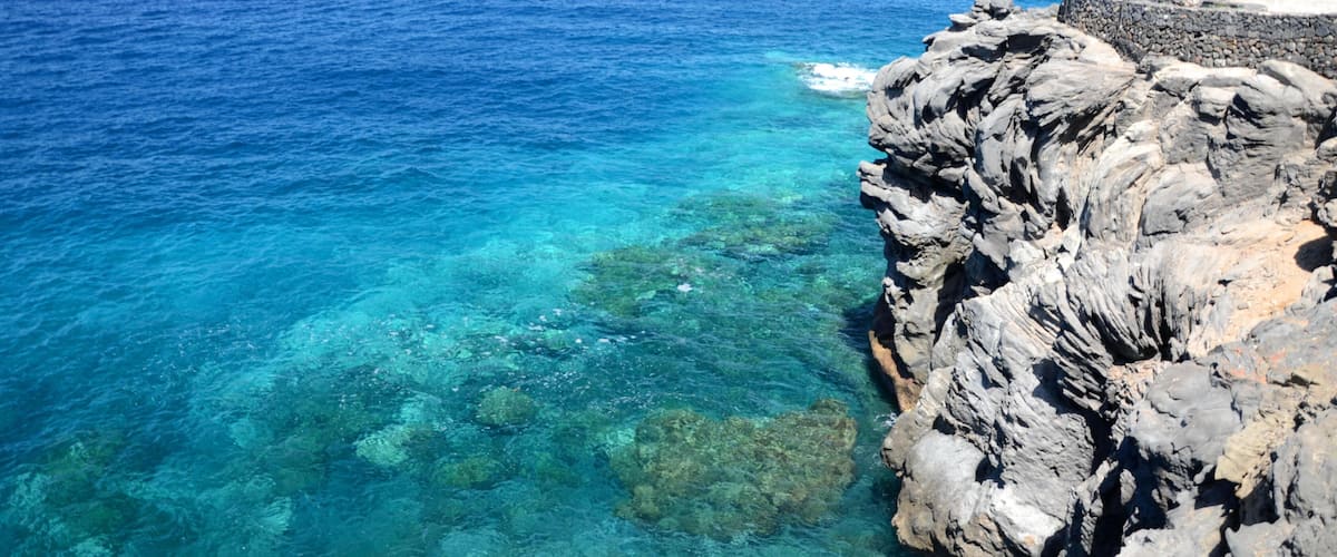 FR10B5 Turquoise bay and volcanic cliffs in Callao Salvaje on Tenerife, Spain. Image shot 07/2015. Exact date unknown.