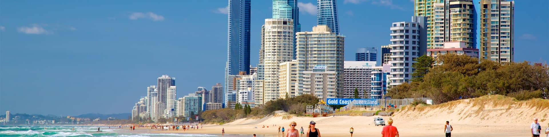 Main Beach showing a coastal town, a high-rise building and a city