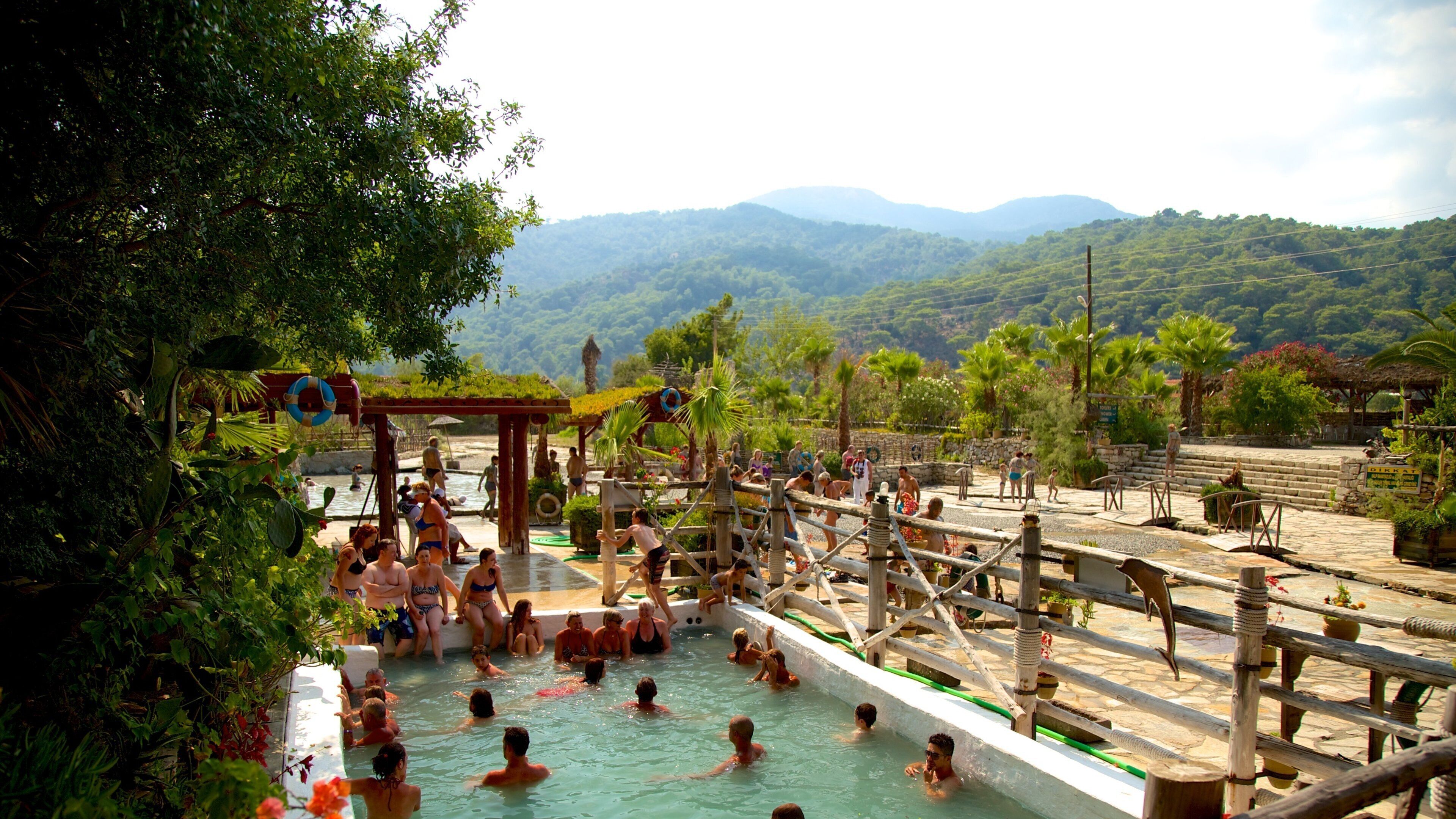 Dalyan featuring a pool as well as a large group of people