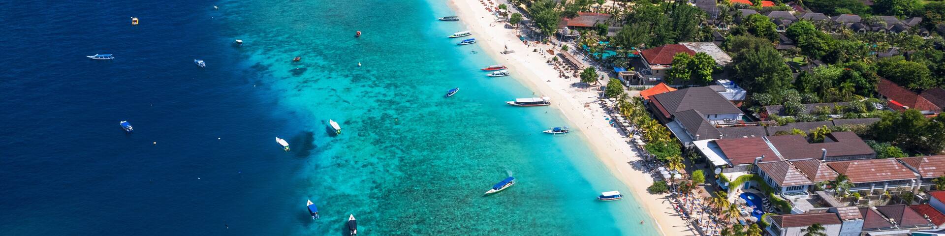 Aerial view of Gili Trawangan beach with boats anchored in the ocean, Gili Trawangan, Gili Islands archipelago, Lombok, West Nusa Tenggara, Indonesia, Southeast Asia