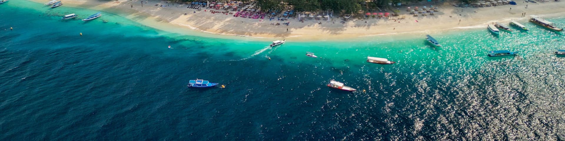 Amazing aerial view of Gili Trawangan coastline on a sunny day, Indonesia