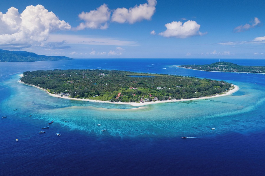 aerial view of Gili Trawangan island with clear blue sky in Lombok, Indonesia