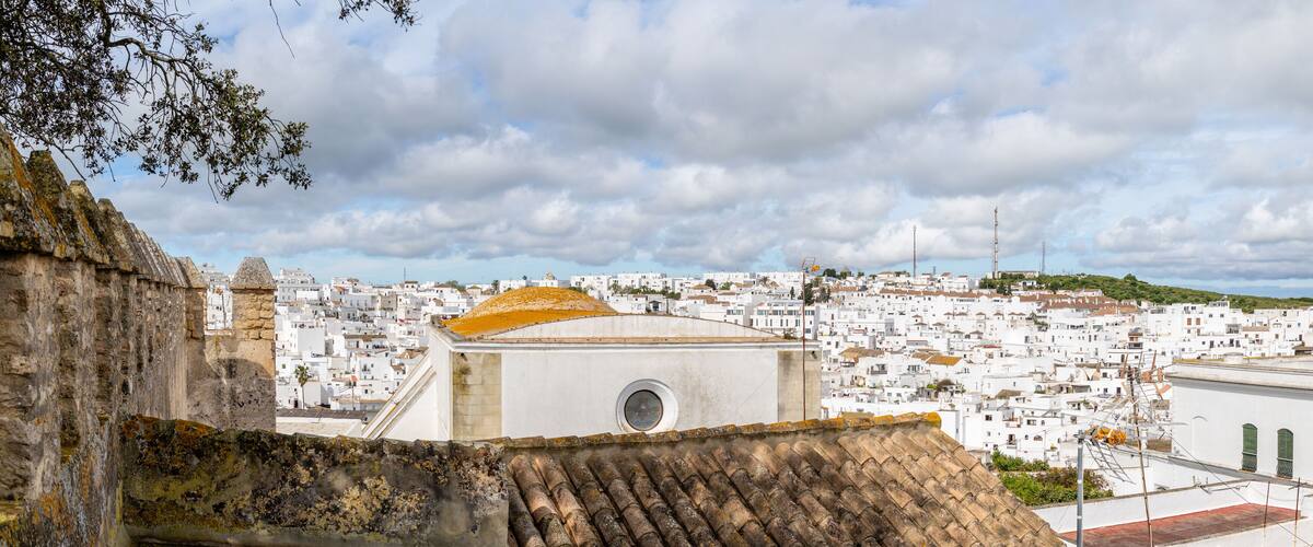 Vejer, Spain - April 17, 2025: Streets of the historic center of the city of Vejer de la Frontera, province of Cadiz, during the Easter festivities in Vejer, Spain.