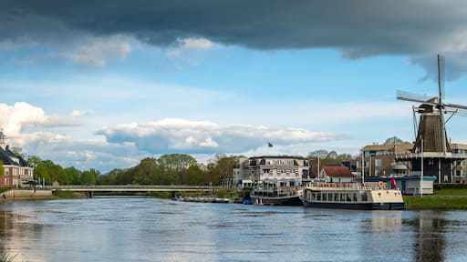 Panorama of Ommen, Province Overijssel. View of the Vechte river and the historical dutch windmill De Konijnenbelt from 1806
