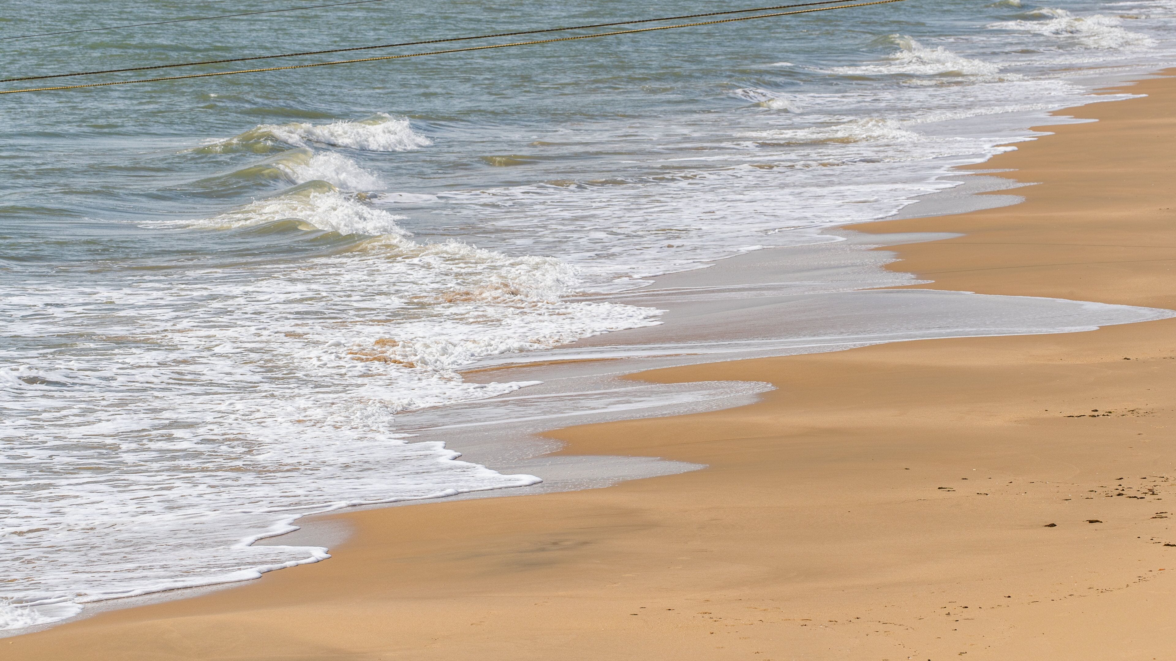 Yorkeys Knob showing general coastal views and a beach
