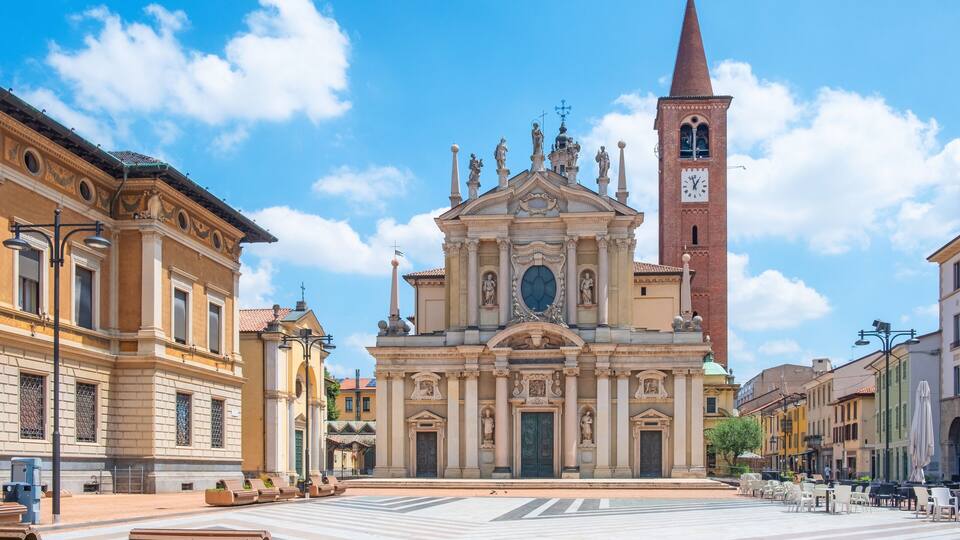 Historic center of Italian city. Busto Arsizio town, piazza San Giovanni with Basilica San Giovanni Battista in province of Varese, Lombardy, Italy. Travel destination