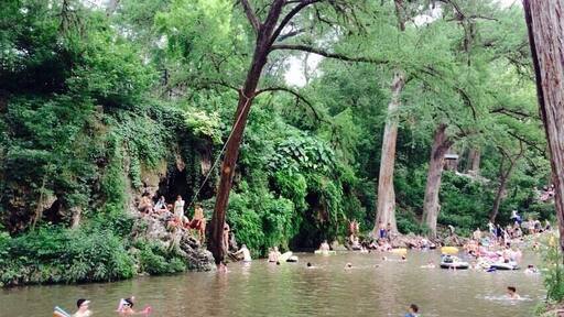 This Texas swimming hole is like your own little oasis. The lush greenery and waterfall almost seems as if you're in a different part of the world. I love love love this spot!