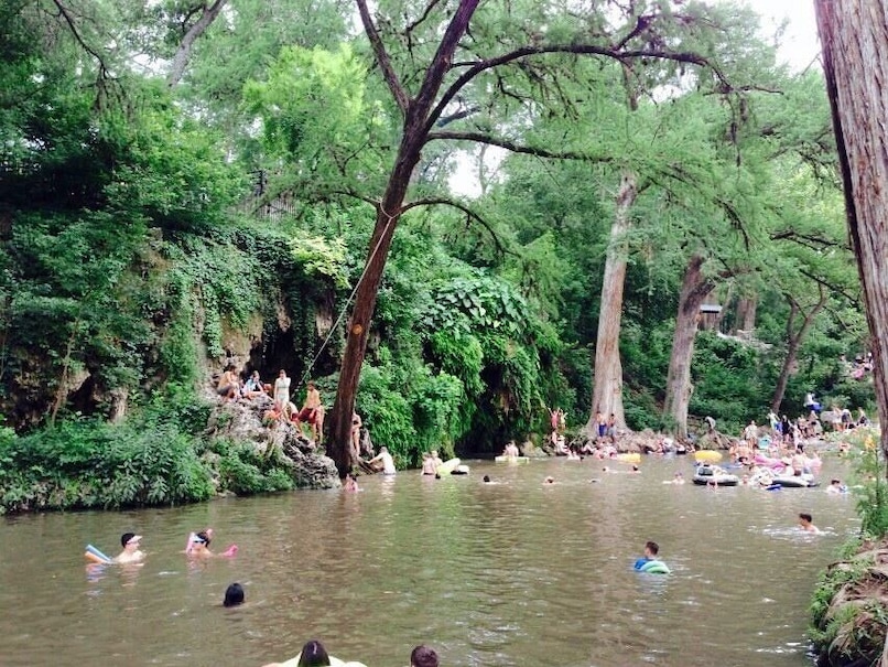 This Texas swimming hole is like your own little oasis. The lush greenery and waterfall almost seems as if you're in a different part of the world. I love love love this spot!