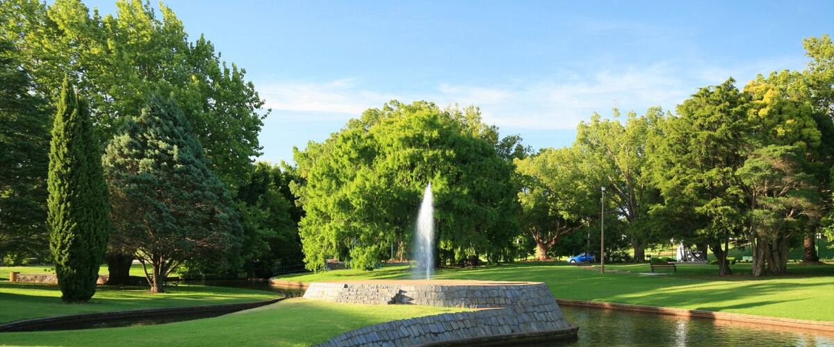 Darling Downs featuring a pond and a park