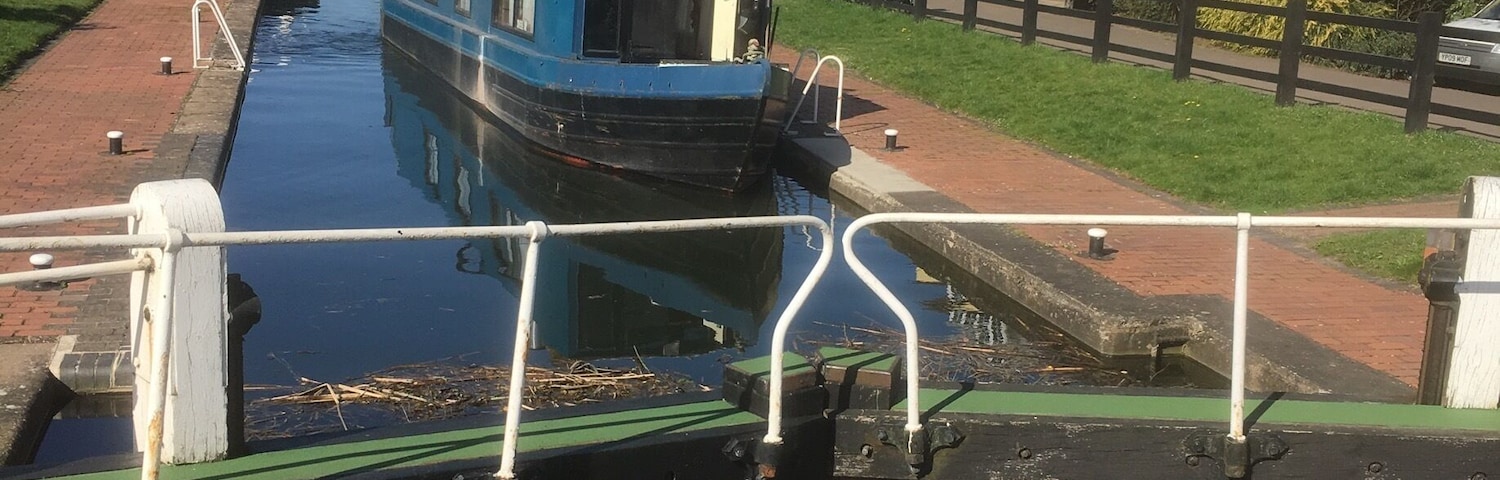Peaceful place to sit and relax while drinking tea or beer or even have a meal out in the sunshine while watching the barges go through the locks on the canal.