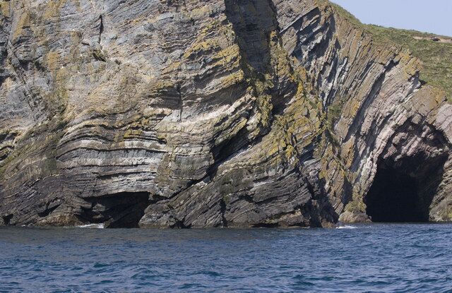 Sea caves Ulbster Caves at Skeps Geo from the sea.
