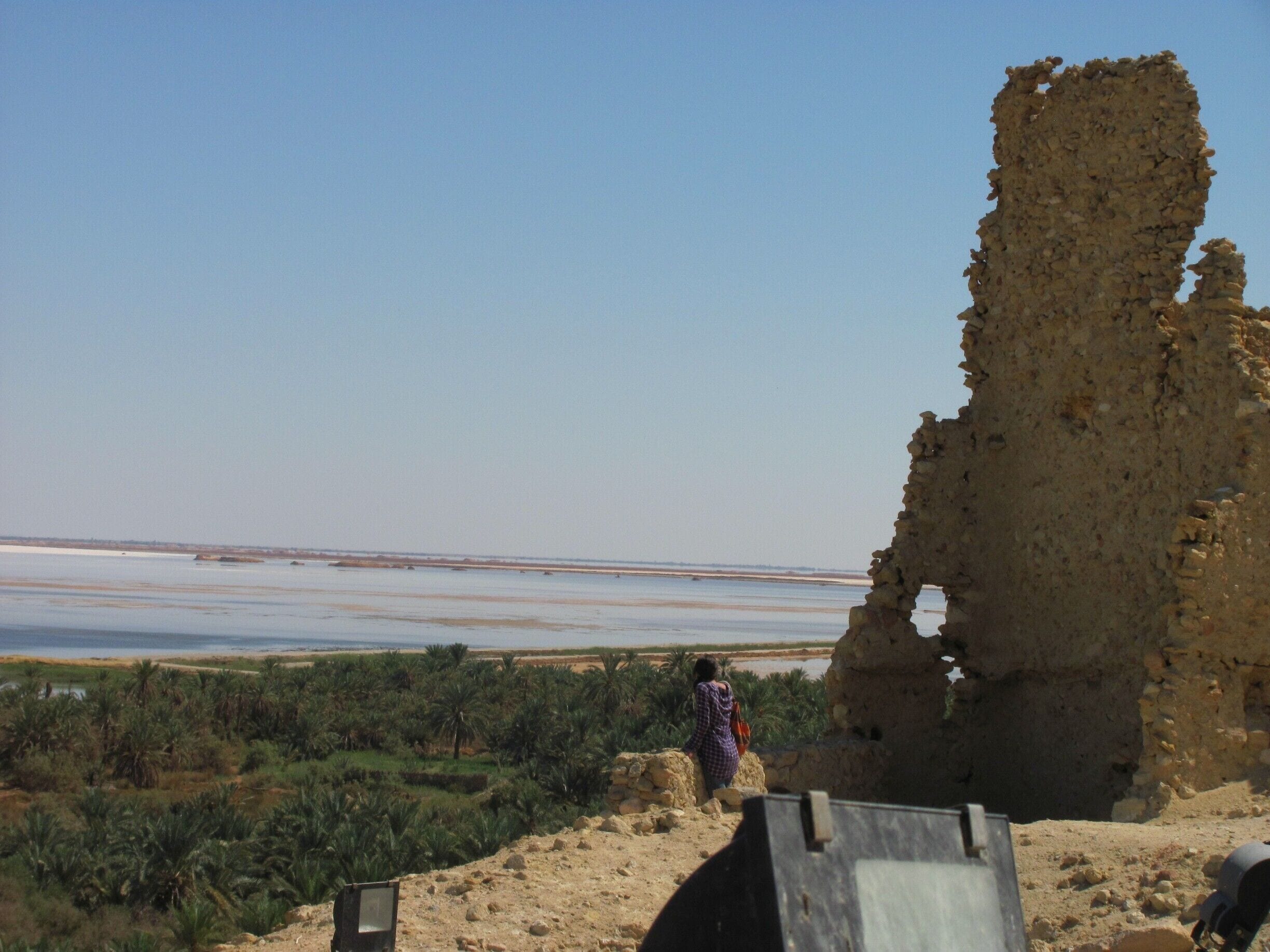 Siwa could be Egypt's best kept secret. If you are in Egypt and are not on a schedule, add this stop to your travels and you won't be disappointed. It is located about an hour east of the border of Libya, it is about an 8 hour drive from Cairo to Siwa.

The mud houses fill the main part of Siwa and have existed there for hundreds of years. It only rains a couple times a year, which is how these buildings still exist, though they are no longer used. There are many cool things to check out in Siwa:

- jump in one or several refreshing springs to cool down with (Cleopatra springs recommended)
- float in thigh deep waters at Siwa Lake (aka Salt Lake); this lake may be just as salty if not saltier than the Dead Sea. Be careful walking on the rocks/sand as the salt may give you tons of tiny laceration that you don't notice till later. There's an island in the middle of the lake that you can walk to since the entire lake is very shallow (about knee to thigh deep depending if you break through the crusty sand surface, very difficult walking but entertaining).
- try sandboarding in the Sahara Desert
- Spend a night at a Bedoin Camp, very authentic
- bikeride around town
- or just enjoy the laidback atmosphere of the town

Truly a one-of-a-kind town.