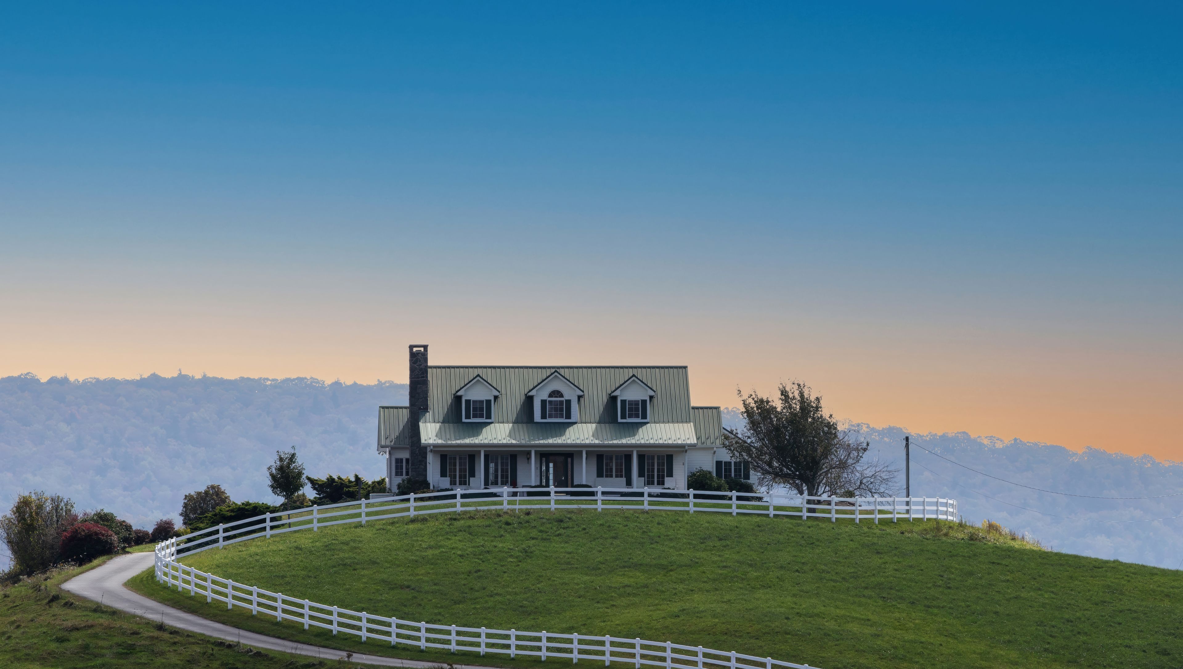 Newland North Carolina. Gorgeous White home on top of the mountain. White Fence