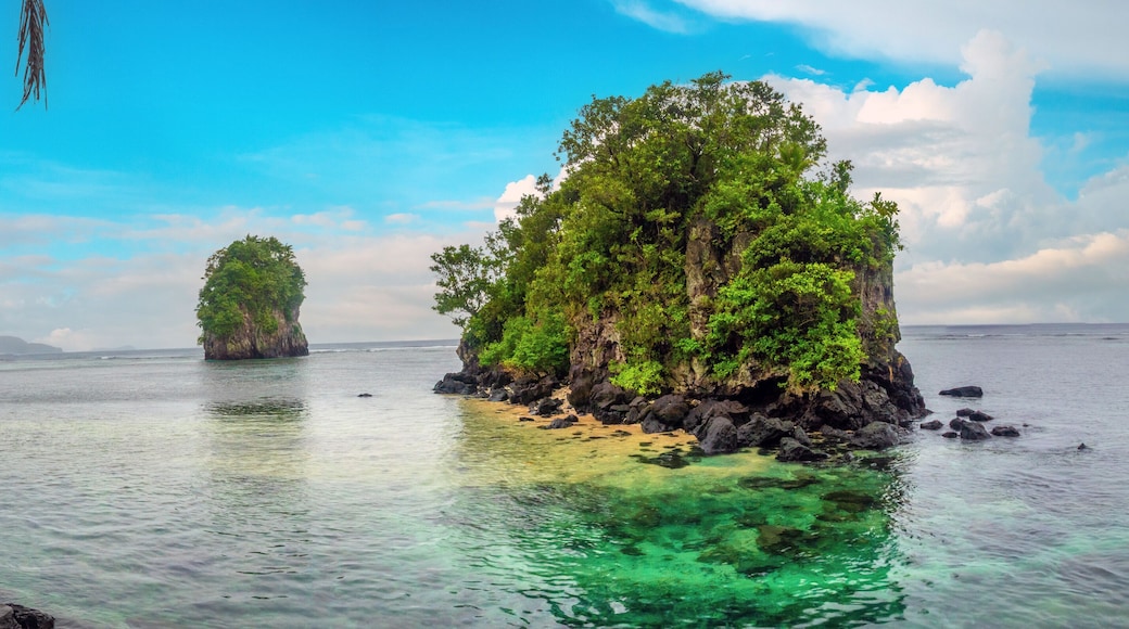 The iconic offshore rock formations known as Fatumafuti (also Fatu ma Futi or Tower Rocks) in American Samoa. Associated with a Samoan love story legend. Tutuila Island, American Samoa