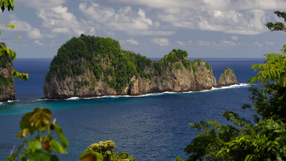 Natural rock formations of the Vai'ava Strait National Natural Landmark stretches out into the Pacific Ocean and is part of the National Park of American Samoa.