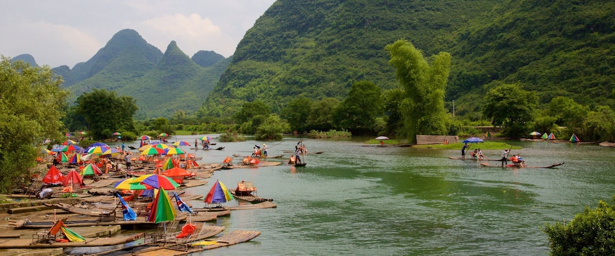 Yangshuo featuring mountains and a river or creek