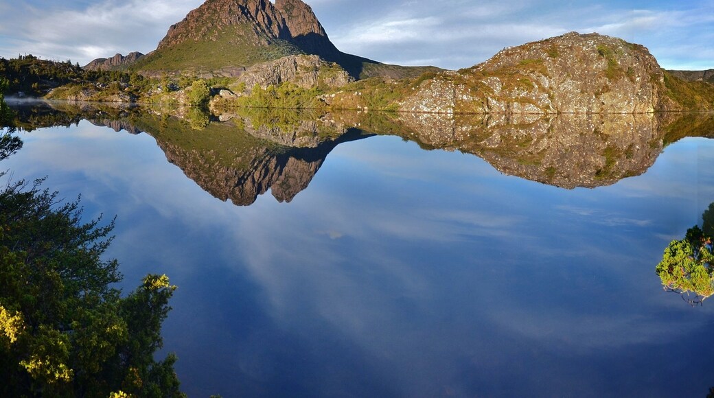 As I said elsewhere, there is so much more to Cradle Mountain than just Dove Lake. I drive about 100 kms, starting around 3.30 a.m. and dodging about 30 pademelons (type of wallaby) and two spotted quolls before reaching Dove Lake. Then I set out in the dark and walked for about 2 hours to reach this spot, hoping all the way the weather would hold. Can't begin to describe my joy when I found it like this.
Little Horn is the immediate peak you can see with Cradle Mountain behind it. If you get the chance, pencil in Twisted Lakes. You'll probably have it all to yourself.