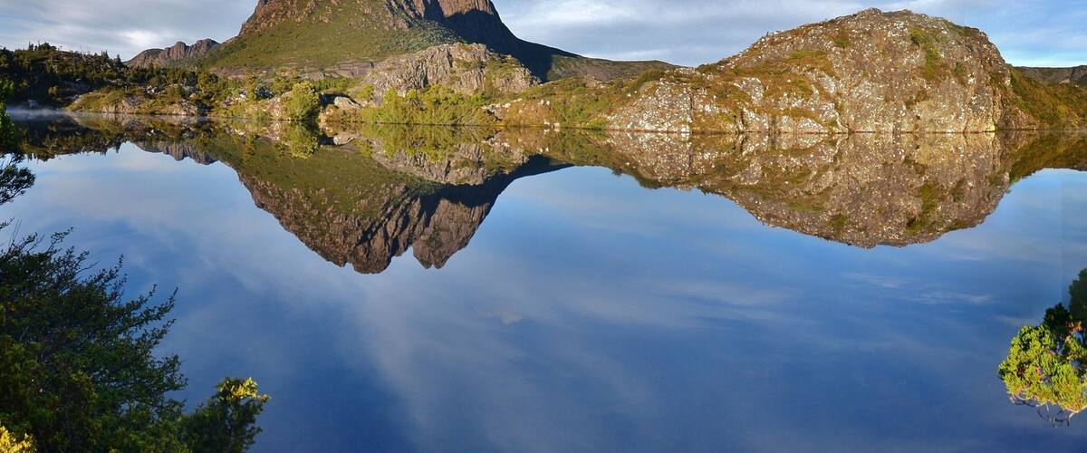 As I said elsewhere, there is so much more to Cradle Mountain than just Dove Lake. I drive about 100 kms, starting around 3.30 a.m. and dodging about 30 pademelons (type of wallaby) and two spotted quolls before reaching Dove Lake. Then I set out in the dark and walked for about 2 hours to reach this spot, hoping all the way the weather would hold. Can't begin to describe my joy when I found it like this.
Little Horn is the immediate peak you can see with Cradle Mountain behind it. If you get the chance, pencil in Twisted Lakes. You'll probably have it all to yourself.