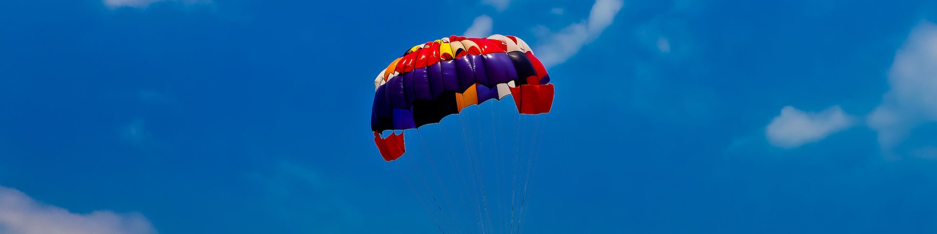 Parasailing in the blue sky, Anyer beach, Indonesia