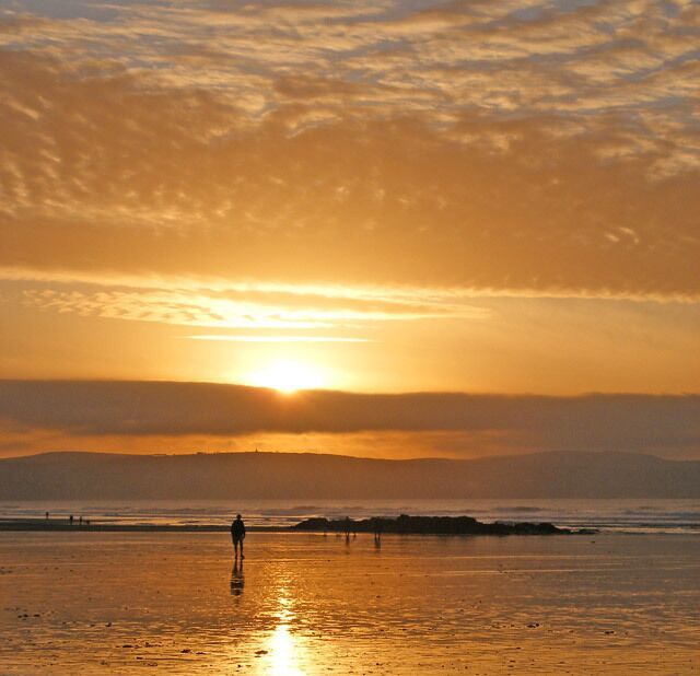A sunset sky over Gwithian beach