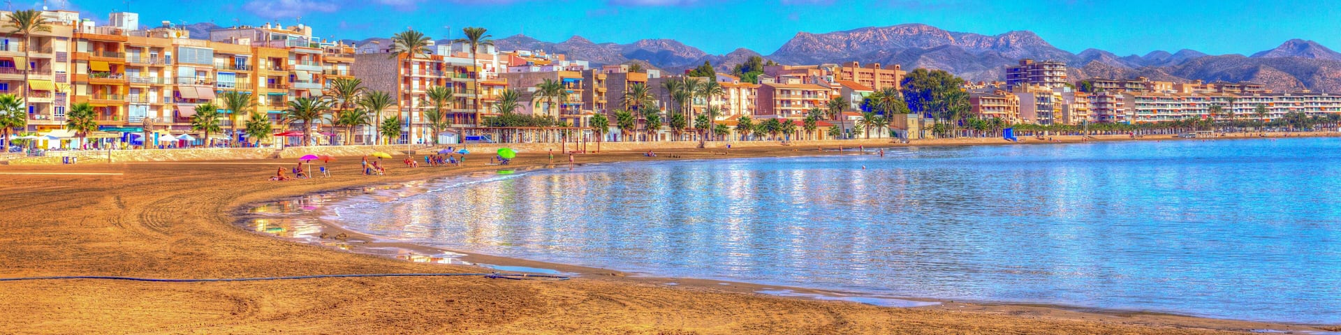 Puerto de Mazarron Murcia Spain beach and sea with bright vivid colours panoramic view
