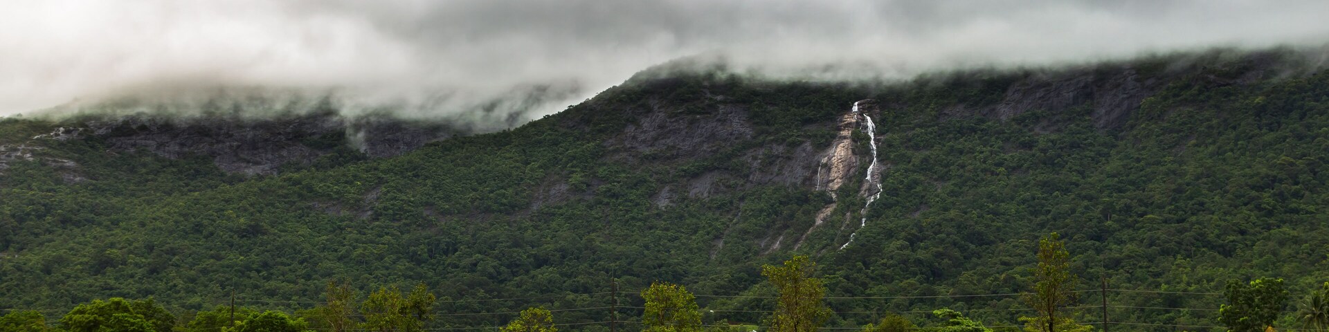 Ngao waterfall with cloud above at Ngao waterfall national park,Ranong,Thailand