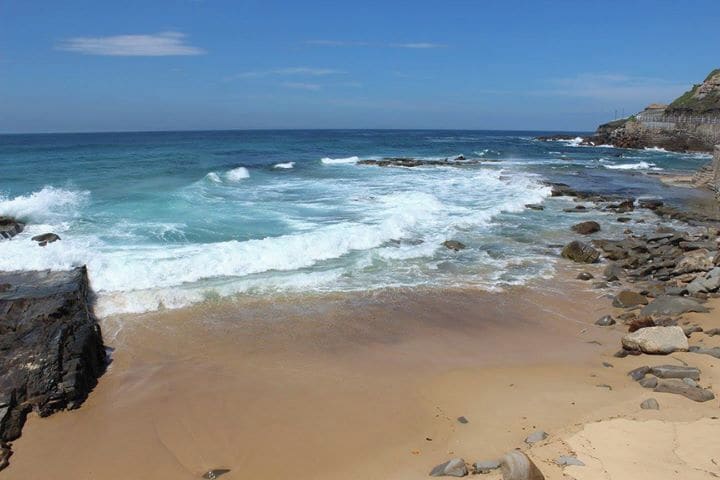 This is Newcastle Beach in NSW, Australia. I love the laid back beach life here. There are several fun shops and cafes nearby. Such a great place! 