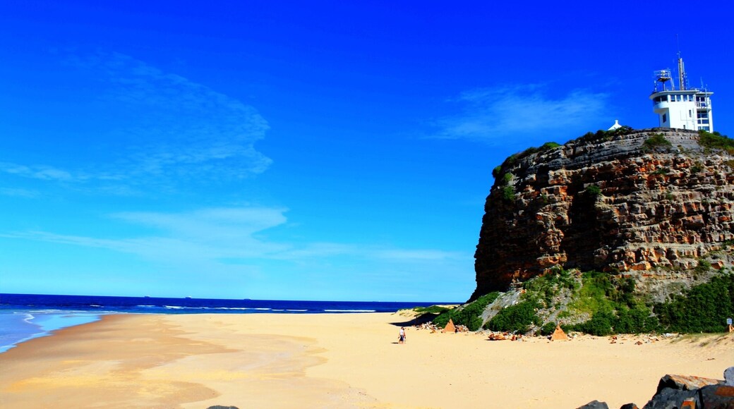 The iconic Nobbys headland. Walk along the break wall for a Vista of the city #beachbound