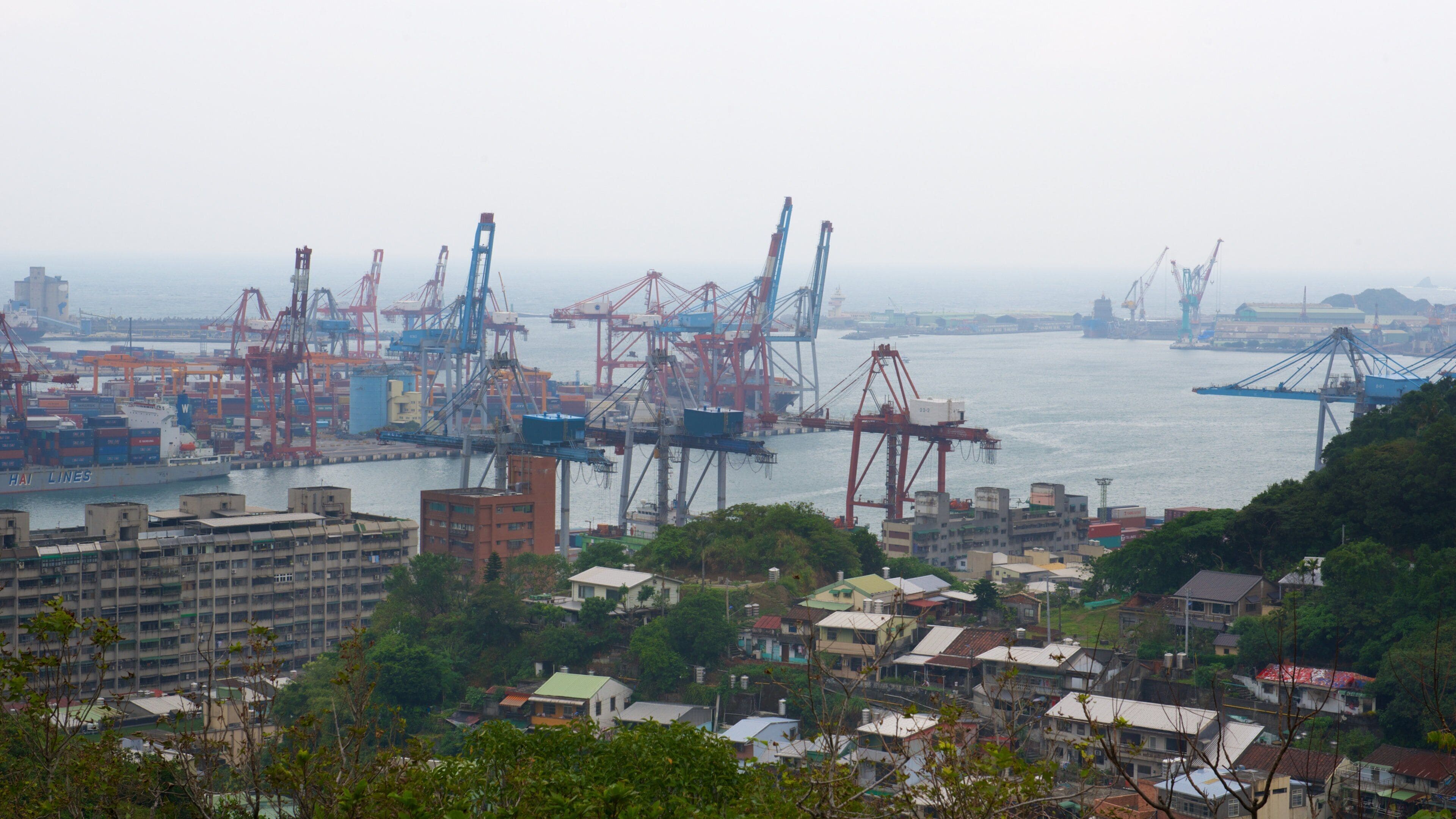 Keelung featuring industrial elements, a bay or harbor and general coastal views