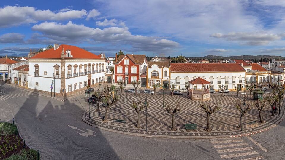 Alter do Chao, Portugal. Largo Barreto Caldeira Square with Alamo Palace in the left, bandstand and typical Portuguese cobblestone pavement