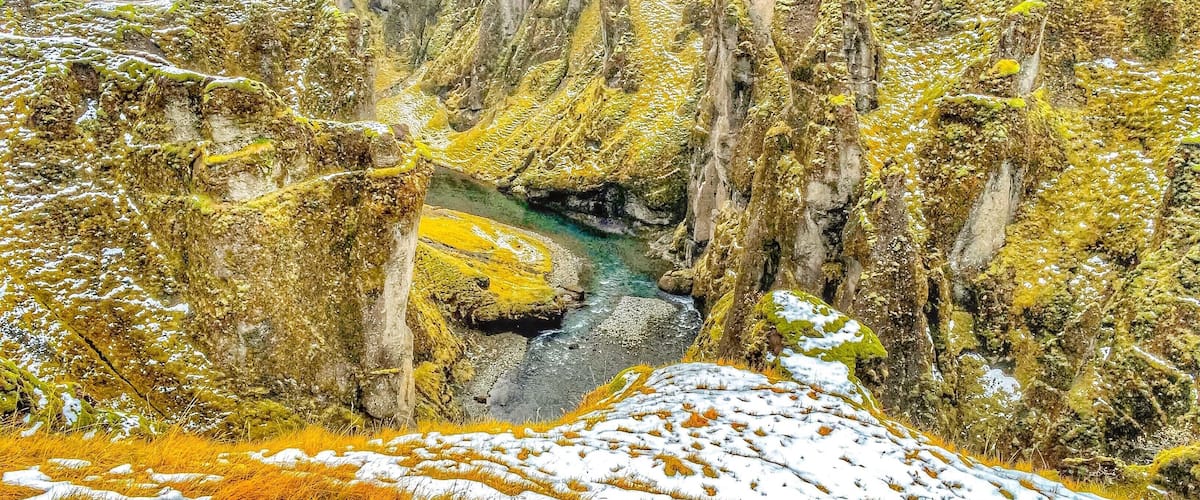 Fjadrargljufur -Grand Canyon, Iceland - a sight to behold to, a bit difficult to find this place but it worth all the effort as the canyon flow two different colors of water and the water won’t combine into one #iceland #red #travel #localsecrets #nationalpark #hiking #nature #landscape #water