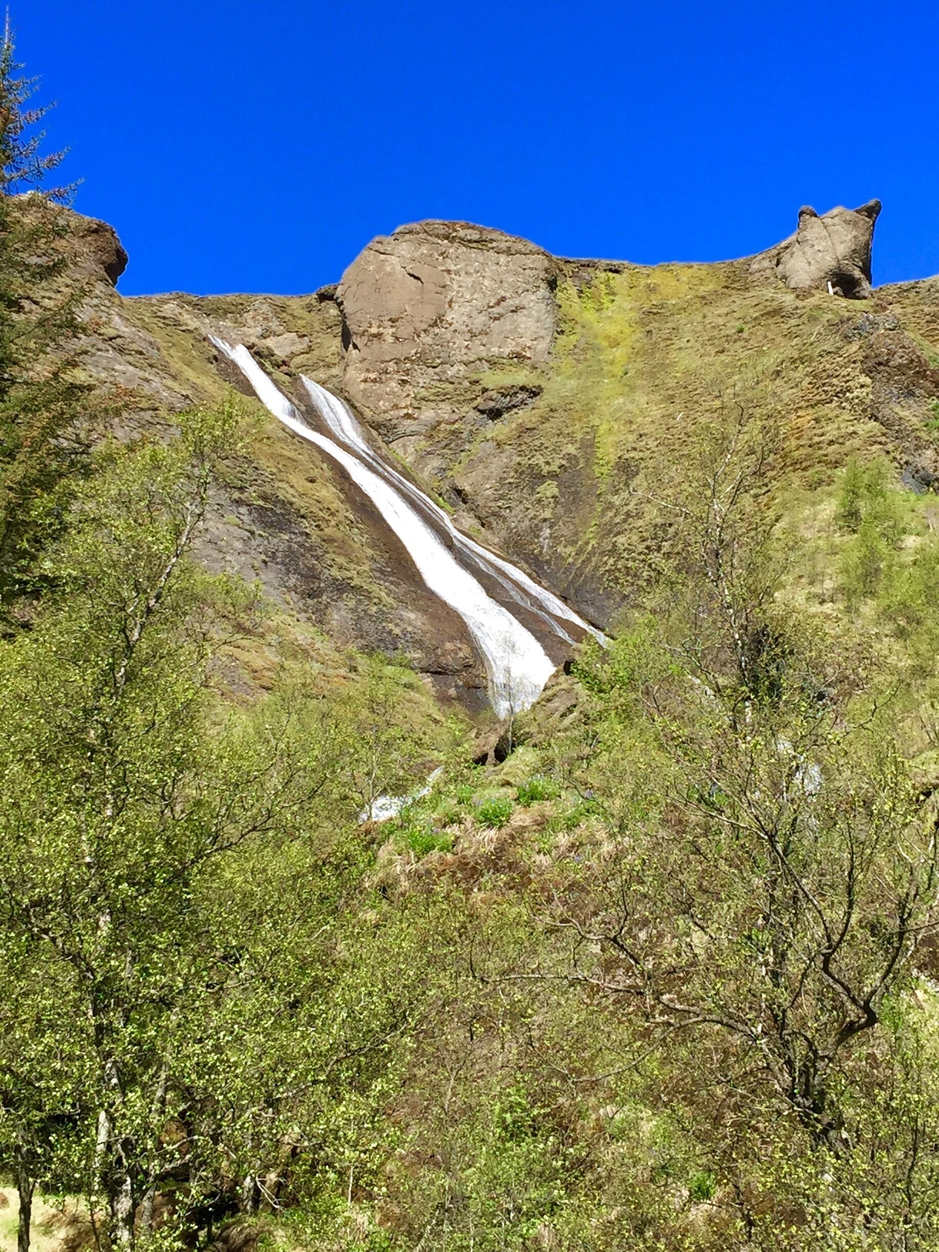 I wanted to find this waterfall as its only a few minutes off from the main roundabout in the town Kirkjubaejarklaustur. Followed signs and hit a dead end. Turned around thinking we wouldn't find it and boom, there it was on the side of the road. I drove right past ofthe first time. Definitely pays to keep your eyes open in Iceland and if you proves if you take the same road both ways, how different you may see things! 