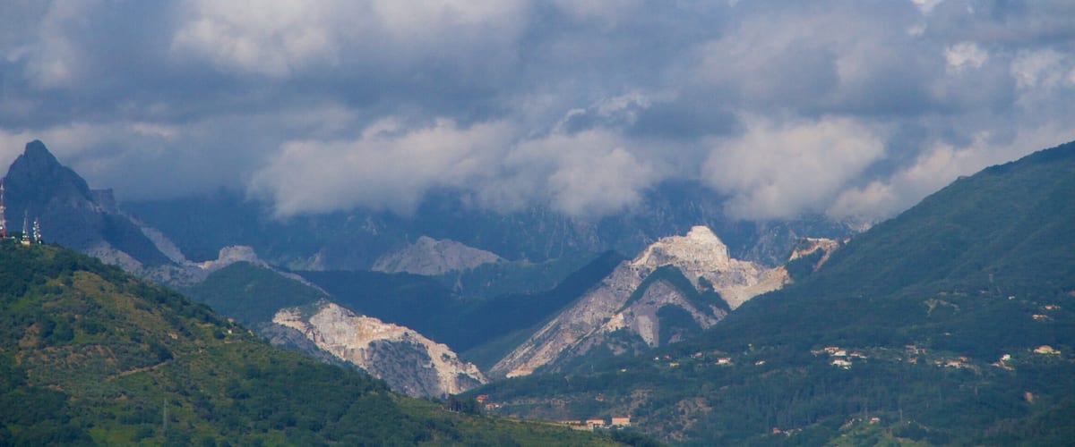 Massa Carrara featuring mist or fog and mountains