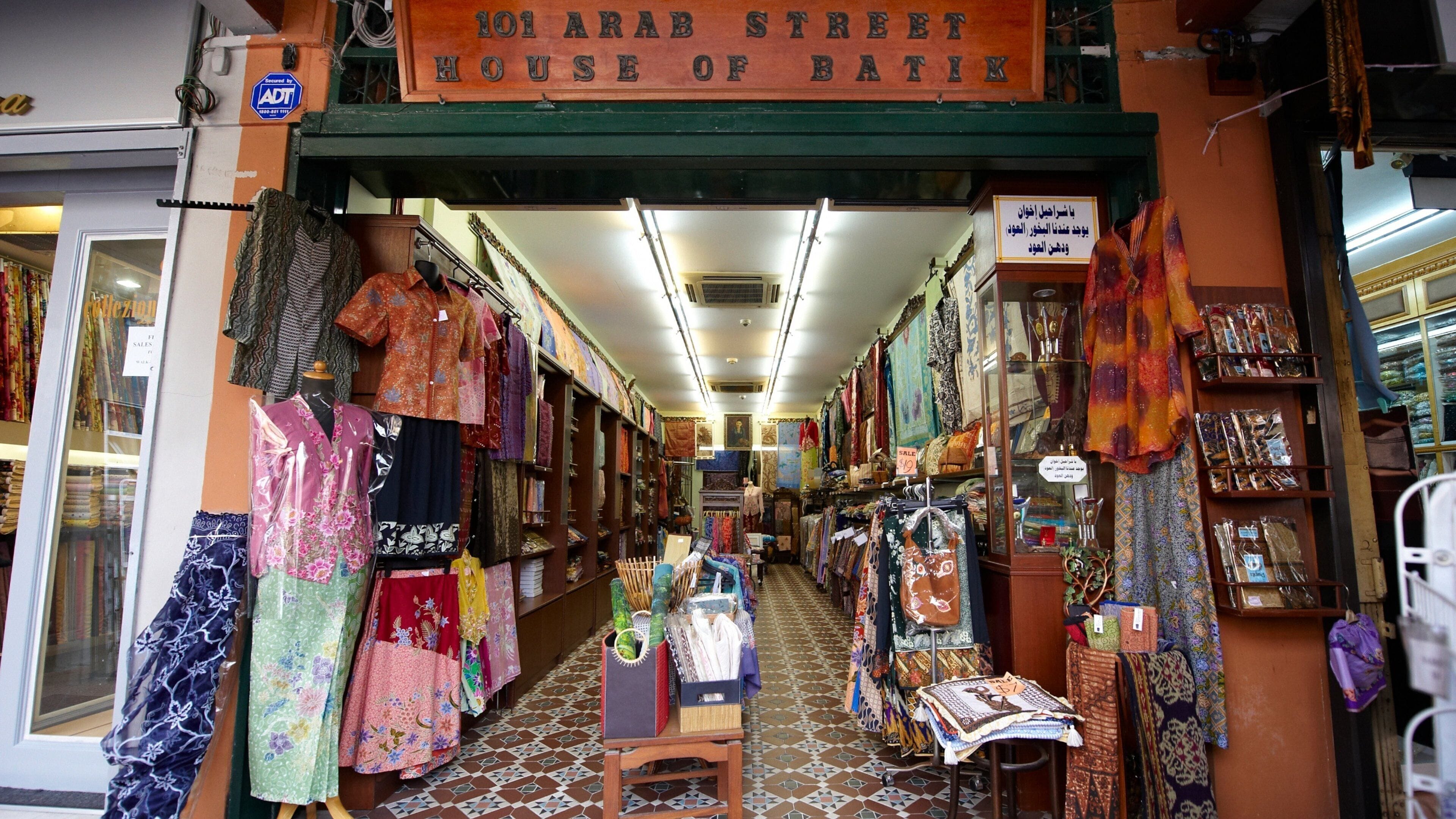 Quartier d\'Arab Street mettant en vedette ville, shopping et signalisation