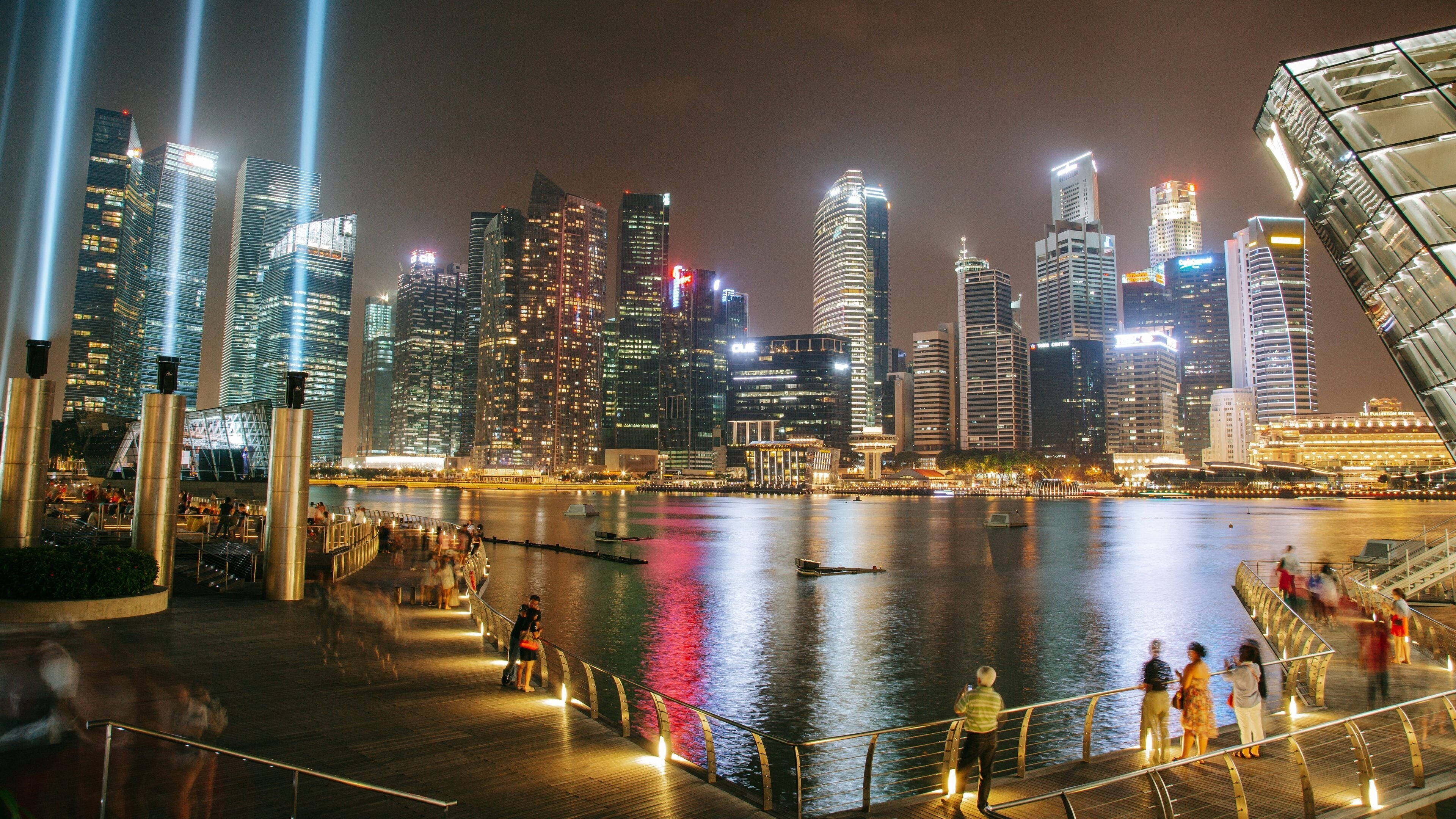 Marina Bay showing a bay or harbor, night scenes and a city