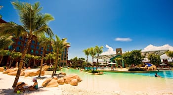 Sentosa Island featuring landscape views, tropical scenes and a coastal town