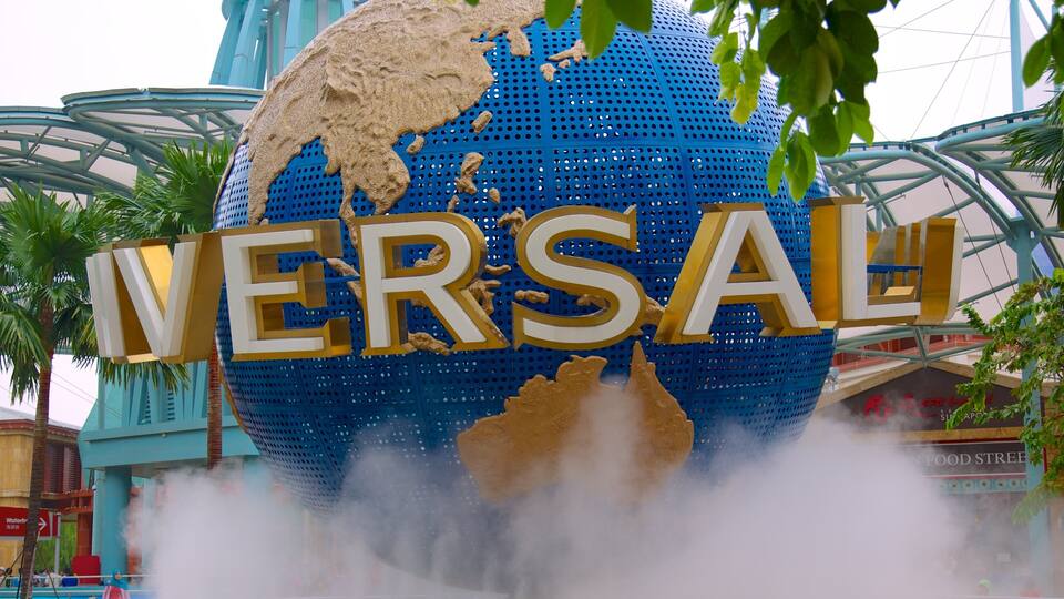 A large globe with 'VERSALI' written on it, surrounded by mist.