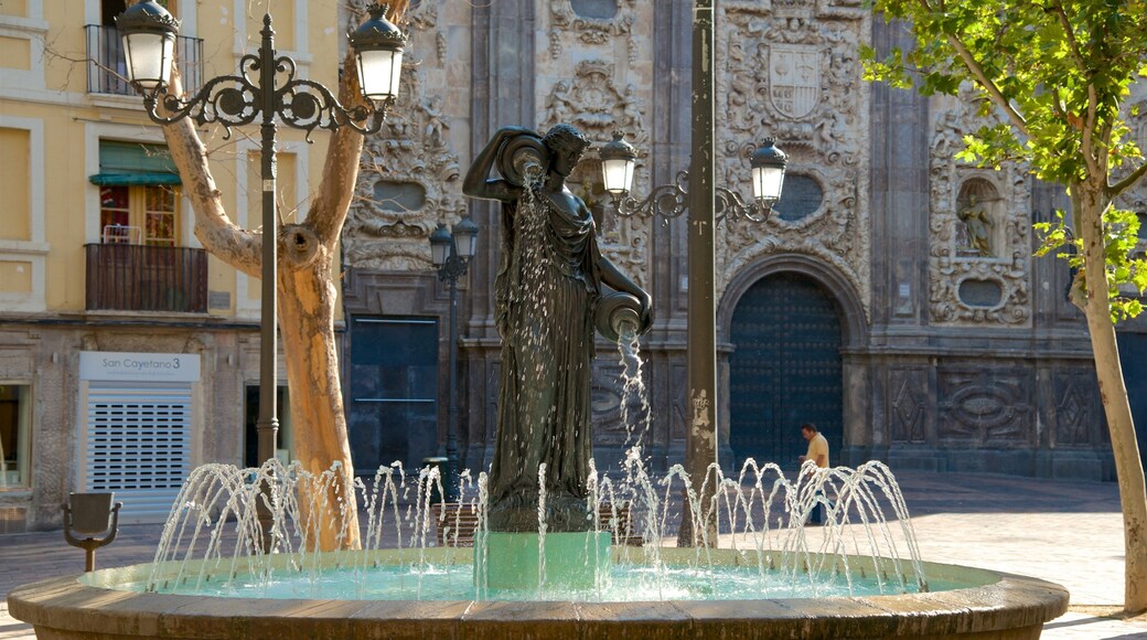 Aragon which includes a statue or sculpture, a fountain and heritage elements
