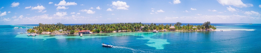 Aerial Drone view of South Water Caye tropical island in Belize barrier reef. A typical Caribbean island with turquoise water
