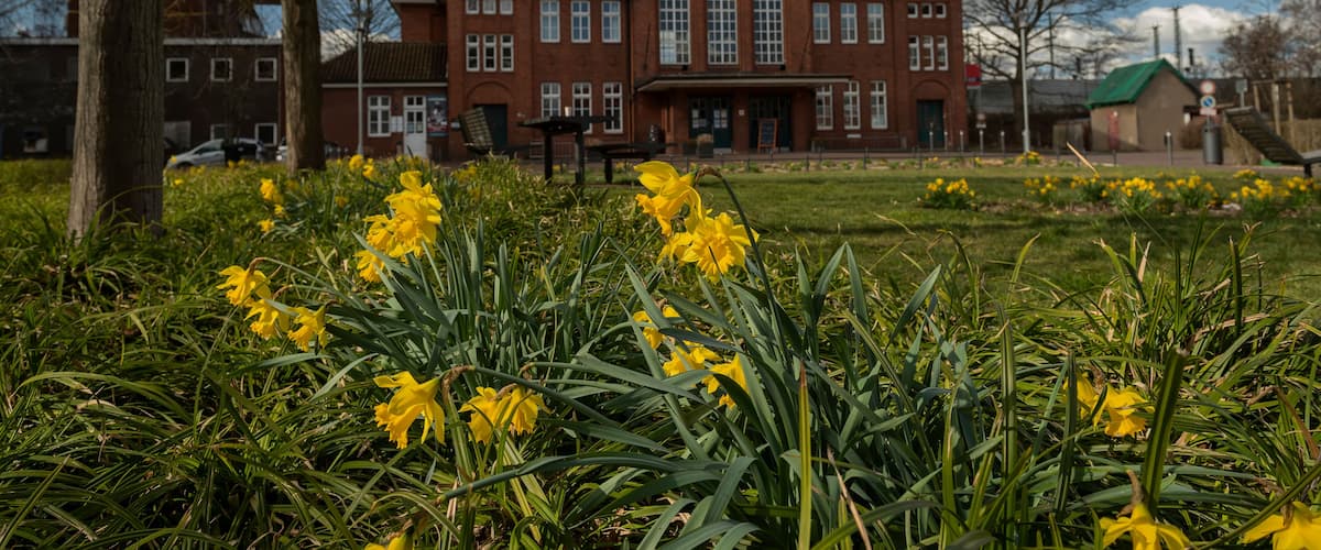 The ancient building of the railway station in the spring in the city of Langenhagen. Hanover. Germany
