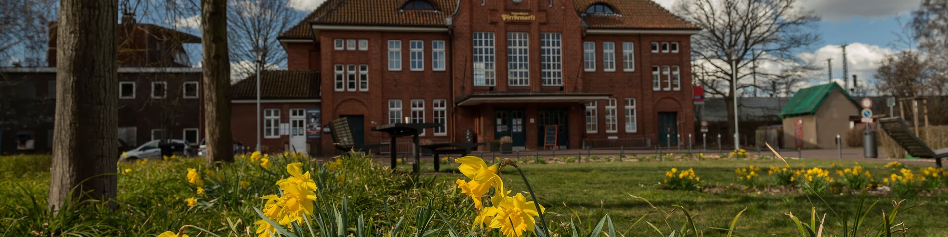 The ancient building of the railway station in the spring in the city of Langenhagen. Hanover. Germany