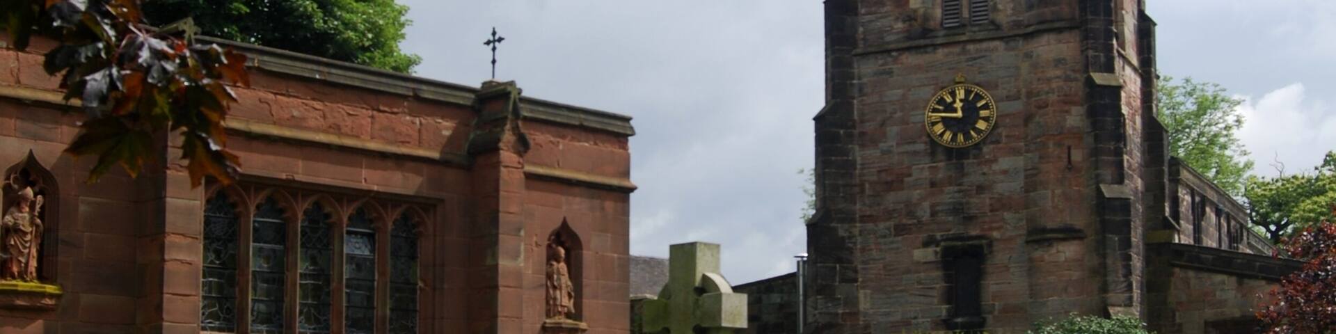St Matthew's church Morley Derbyshire with Garden of Rememberance in foreground.