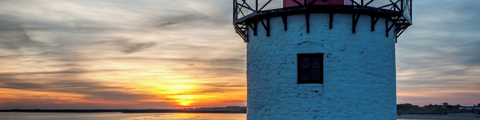 Quite a famous little landmark, Burry Port Lighthouse seen here during a winter sunset.